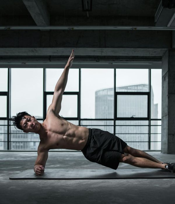 Man in a focused stance, illustrating core stability and balance.